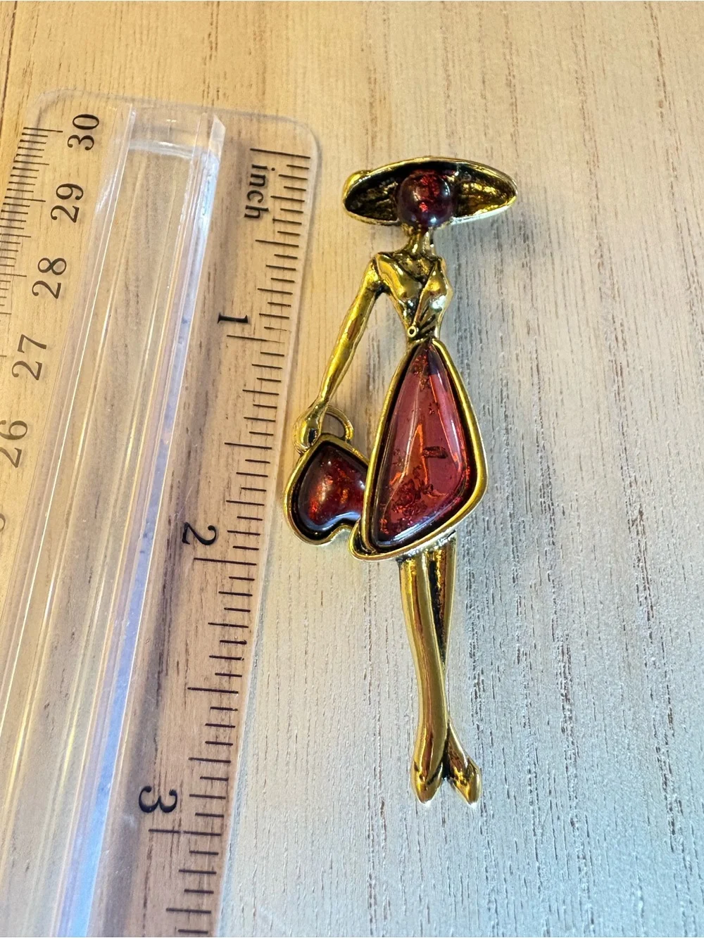 Gold Tone Lady Brooch with Deep Red Glass Accents